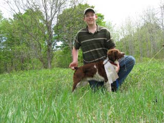 Riley Pitman with his young Brittany, Riley's Magnum Winchester